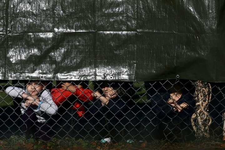 People at the fence line in Manston